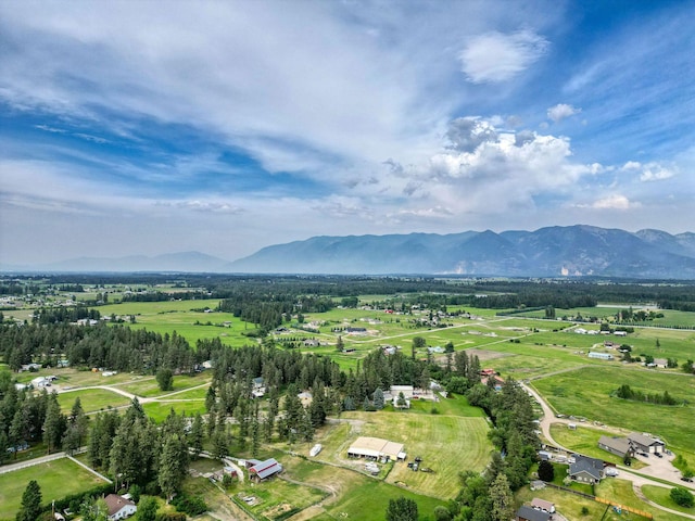 791 Springwood Ln, Kalispell, MT 59901 - aerial view of property and surrounding area featuring a mountain backdrop and rural landscape