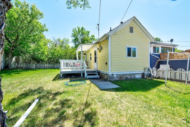820 11th Ave, Helena, MT 59601 - back of property with a wooden deck and a fenced backyard