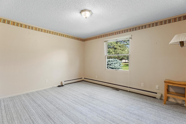 1229 Old Orchard Rd, Missoula, MT 59802 - carpeted spare room featuring a textured ceiling and a baseboard heating unit