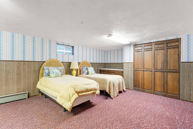 1229 Old Orchard Rd, Missoula, MT 59802 - carpeted bedroom featuring wallpapered walls, a wainscoted wall, and a baseboard radiator