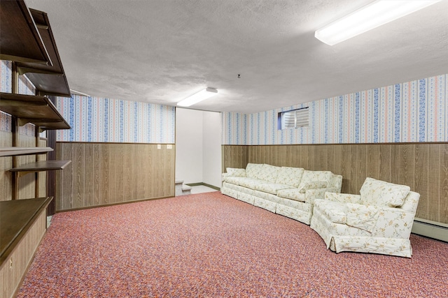 1229 Old Orchard Rd, Missoula, MT 59802 - unfurnished living room with wallpapered walls, a wainscoted wall, carpet floors, a baseboard radiator, and a textured ceiling