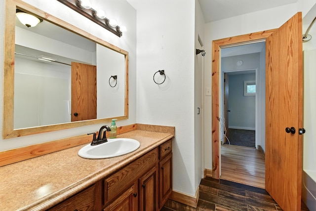 3121 6th Ave S, Great Falls, MT 59405 - bathroom featuring vanity and wood finished floors