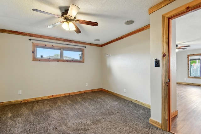 3121 6th Ave S, Great Falls, MT 59405 - carpeted empty room with a ceiling fan, a textured ceiling, and ornamental molding