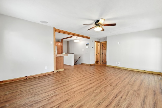 3121 6th Ave S, Great Falls, MT 59405 - unfurnished living room with ceiling fan and light wood-type flooring
