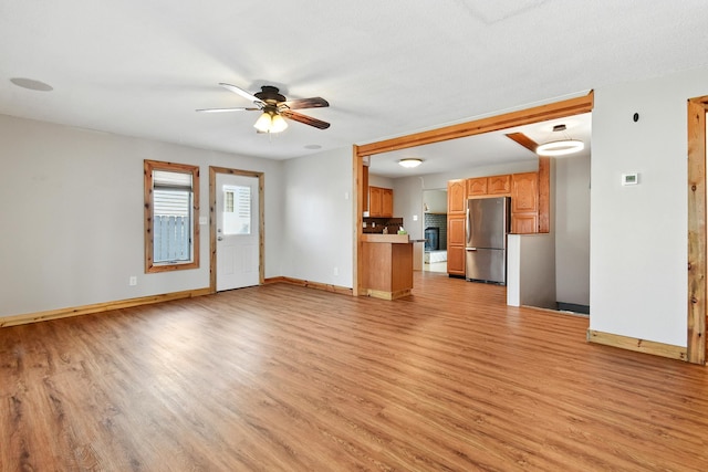 3121 6th Ave S, Great Falls, MT 59405 - unfurnished living room featuring light wood finished floors and ceiling fan