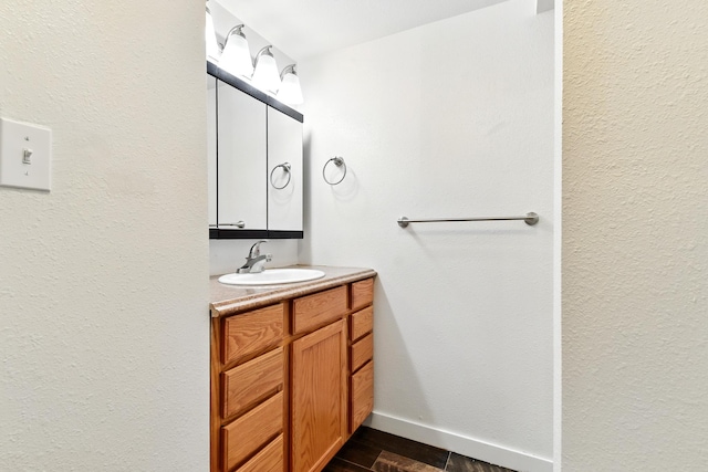 3121 6th Ave S, Great Falls, MT 59405 - bathroom with vanity and wood finished floors
