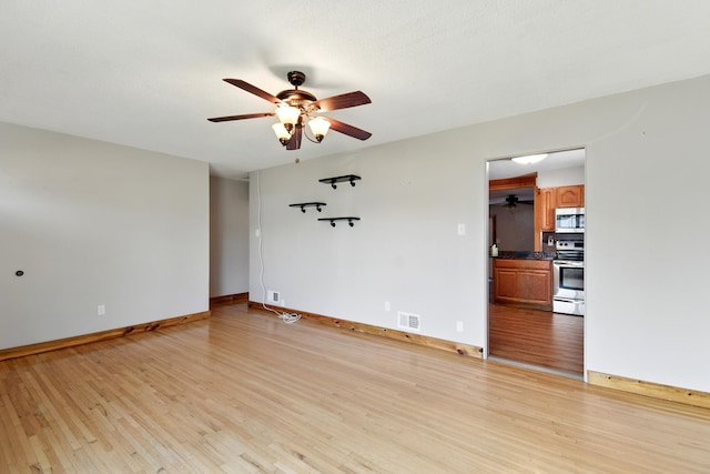 3121 6th Ave S, Great Falls, MT 59405 - spare room featuring ceiling fan and light wood-style flooring