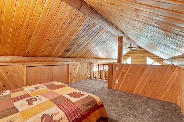 72 Giefer Creek Rd, Essex, MT 59916 - carpeted bedroom featuring wood walls, lofted ceiling, and wooden ceiling