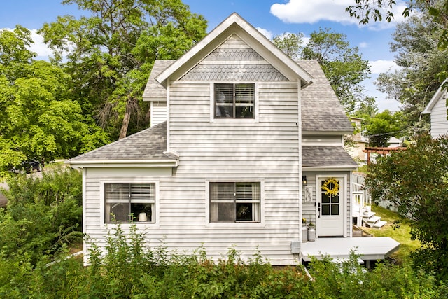 223 12th St N, Great Falls, MT 59401 - back of house featuring a shingled roof and a deck