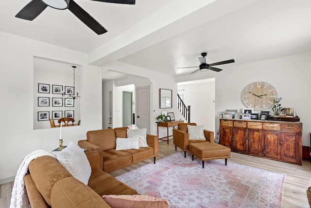 223 12th St N, Great Falls, MT 59401 - living area featuring ceiling fan, stairway, and light wood-style flooring