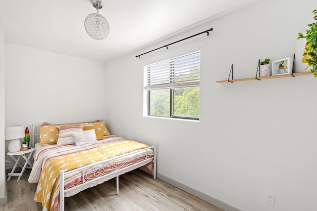 223 12th St N, Great Falls, MT 59401 - bedroom with light wood finished floors and baseboards