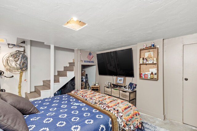 223 12th St N, Great Falls, MT 59401 - bedroom featuring unfinished concrete floors
