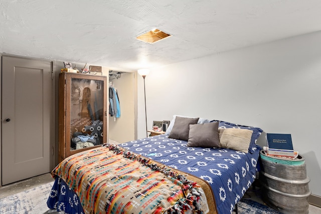 223 12th St N, Great Falls, MT 59401 - bedroom with a closet and concrete flooring