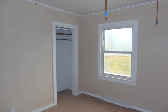 17 Crane Ave, Stockett, MT 59480 - unfurnished bedroom featuring crown molding, a closet, and light colored carpet