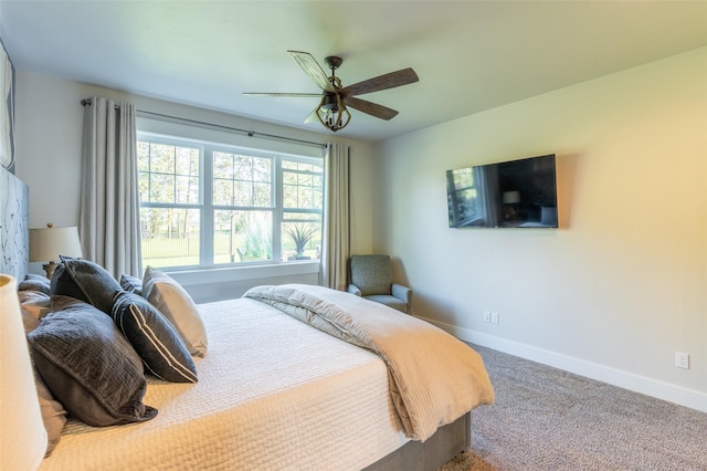 128 Antler Peak Ln, Kalispell, MT 59901 - carpeted bedroom featuring baseboards and a ceiling fan