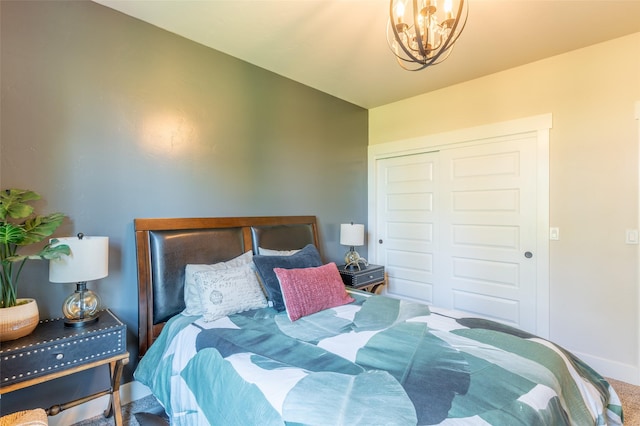 128 Antler Peak Ln, Kalispell, MT 59901 - bedroom with a chandelier, carpet floors, and a closet