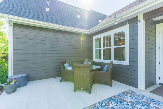128 Antler Peak Ln, Kalispell, MT 59901 - view of patio / terrace with outdoor dining space