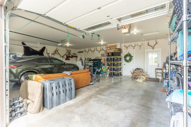 128 Antler Peak Ln, Kalispell, MT 59901 - garage featuring a garage door opener