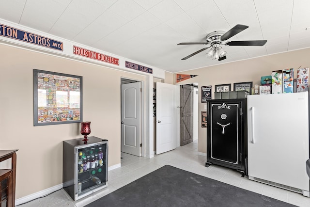 1237 Park Garden Rd, Great Falls, MT 59404 - misc room featuring tile patterned floors, ceiling fan, and wine cooler