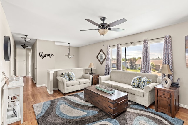 1237 Park Garden Rd, Great Falls, MT 59404 - living area with light wood-type flooring and a ceiling fan