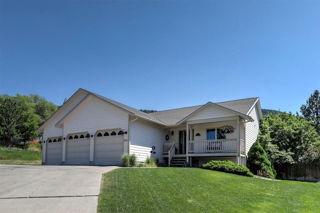 1585 Stanley St, Missoula, MT 59802 - ranch-style home with covered porch, an attached garage, driveway, and roof with shingles