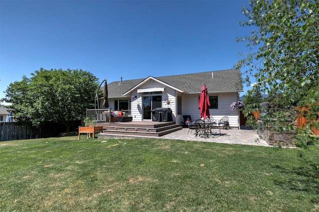 1585 Stanley St, Missoula, MT 59802 - rear view of property with a patio, a wooden deck, and a shingled roof
