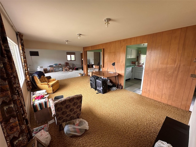 521 N Central Ave, Ekalaka, MT 59324 - carpeted living area featuring wooden walls