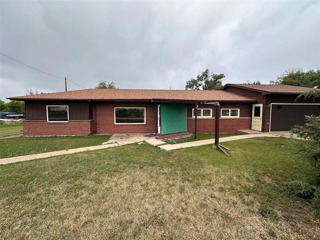 521 N Central Ave, Ekalaka, MT 59324 - ranch-style house with brick siding, a garage, a front yard, and board and batten siding