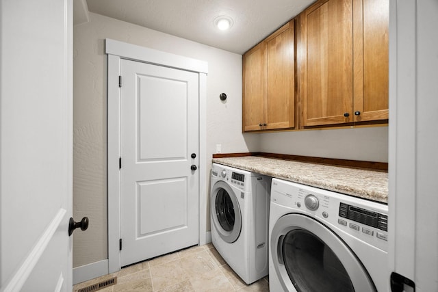 150 Swede Trl, Kalispell, MT 59901 - laundry room featuring independent washer and dryer and cabinet space