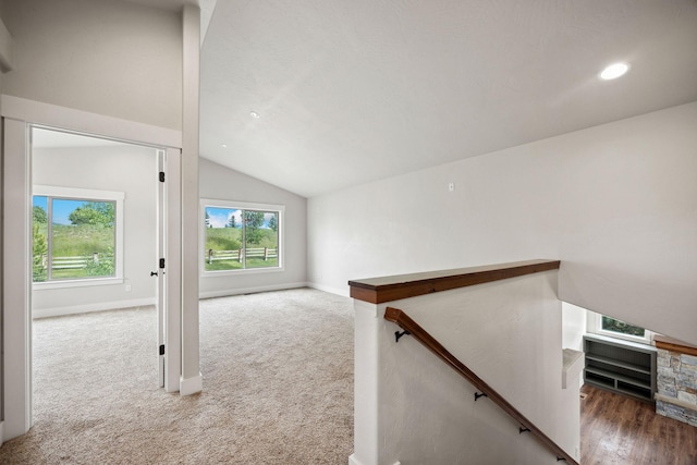 150 Swede Trl, Kalispell, MT 59901 - stairs featuring lofted ceiling, carpet floors, and recessed lighting