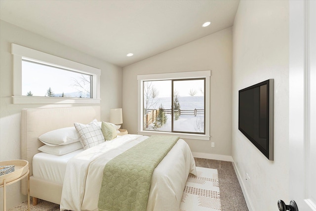 150 Swede Trl, Kalispell, MT 59901 - carpeted bedroom with vaulted ceiling and recessed lighting