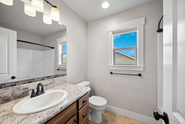 150 Swede Trl, Kalispell, MT 59901 - full bath with vanity, a shower, and tasteful backsplash