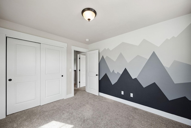 150 Swede Trl, Kalispell, MT 59901 - unfurnished bedroom featuring carpet floors and a closet