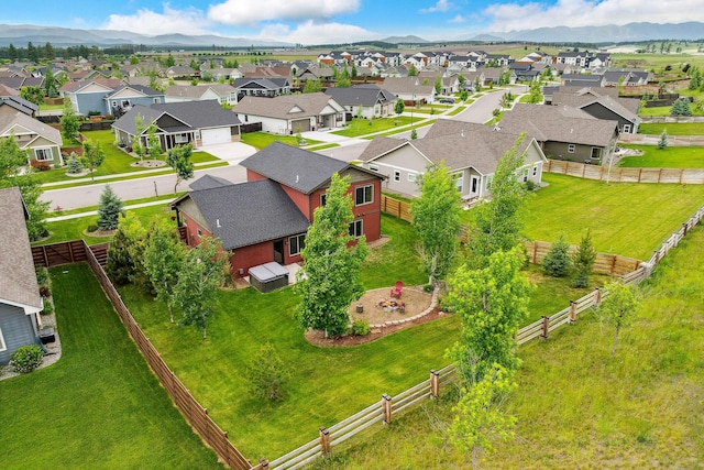 150 Swede Trl, Kalispell, MT 59901 - aerial perspective of suburban area with a mountain backdrop