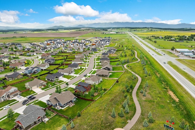 150 Swede Trl, Kalispell, MT 59901 - aerial perspective of suburban area with a mountain backdrop