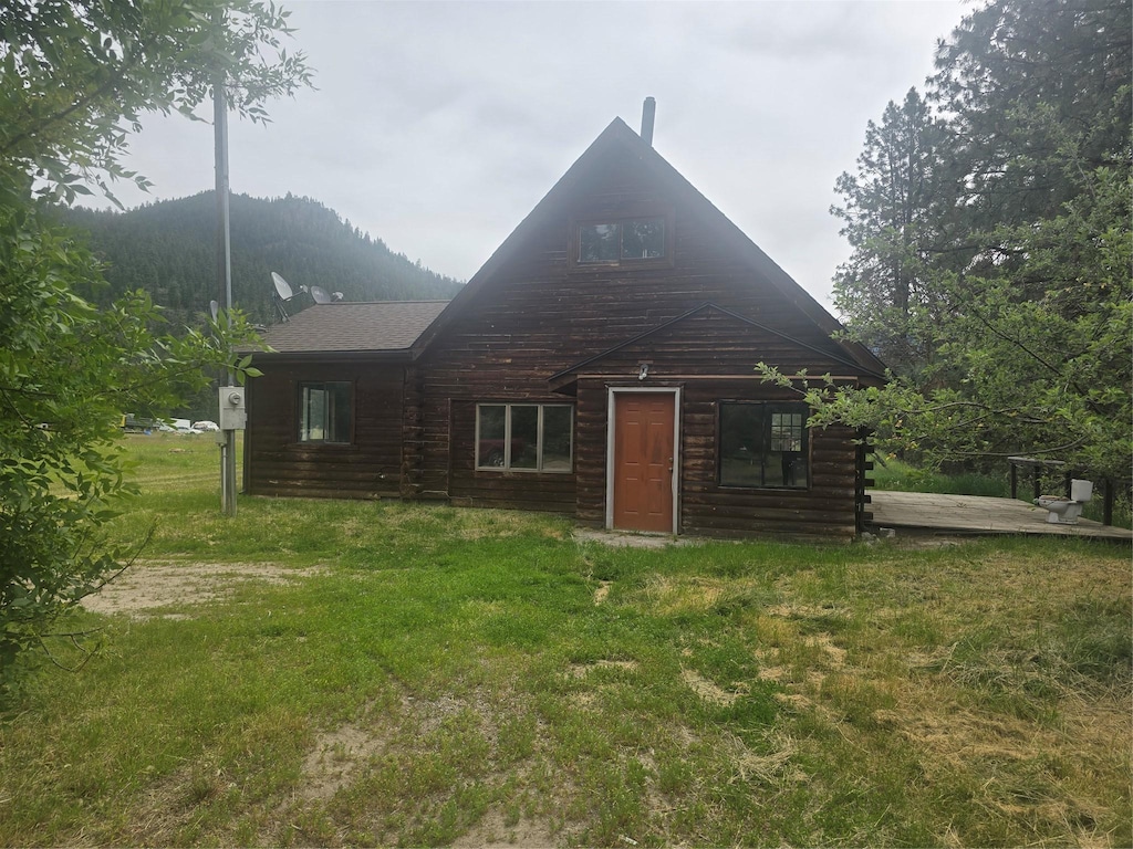 40 Larch Ln, Saint Regis, MT 59866 - back of property with a yard and log exterior