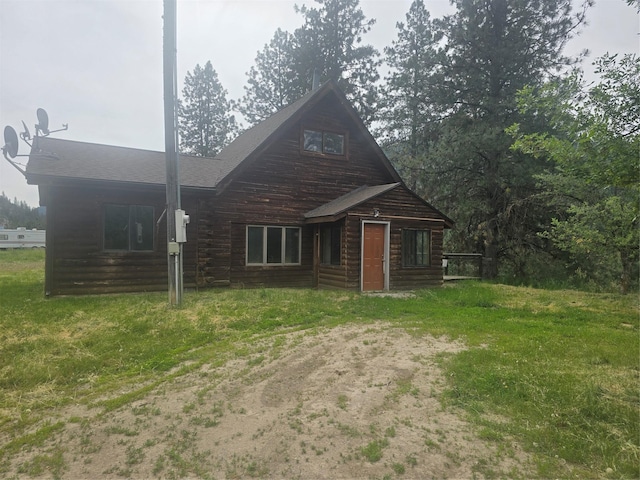 40 Larch Ln, Saint Regis, MT 59866 - log home featuring a front lawn