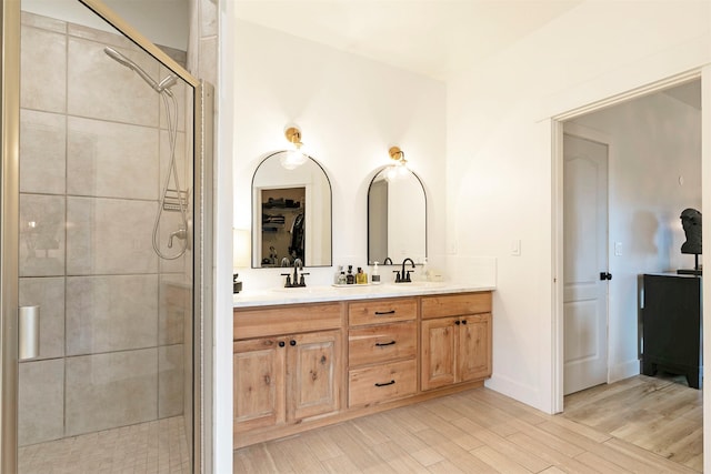 15660 Sara Jo Ln, Frenchtown, MT 59834 - full bath featuring double vanity, a shower stall, and wood finished floors