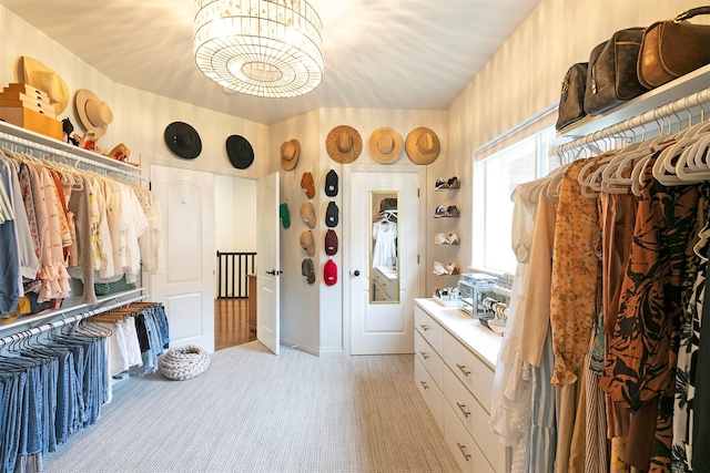 15660 Sara Jo Ln, Frenchtown, MT 59834 - spacious closet featuring light carpet and a chandelier