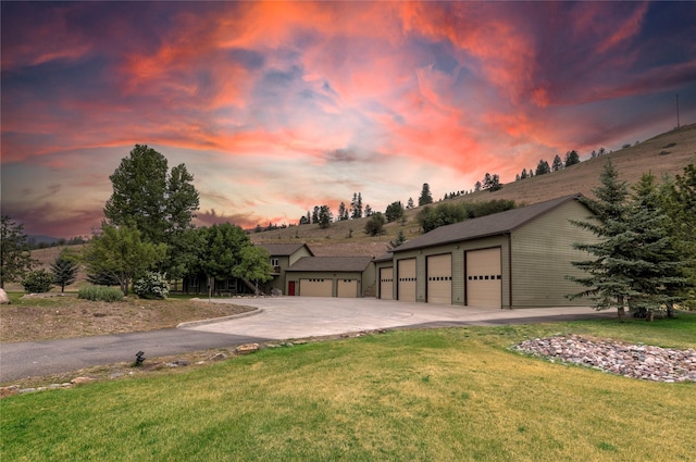 15660 Sara Jo Ln, Frenchtown, MT 59834 - view of front facade with a yard, driveway, and a garage