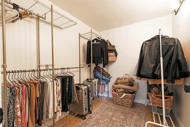 15660 Sara Jo Ln, Frenchtown, MT 59834 - walk in closet featuring wood finished floors