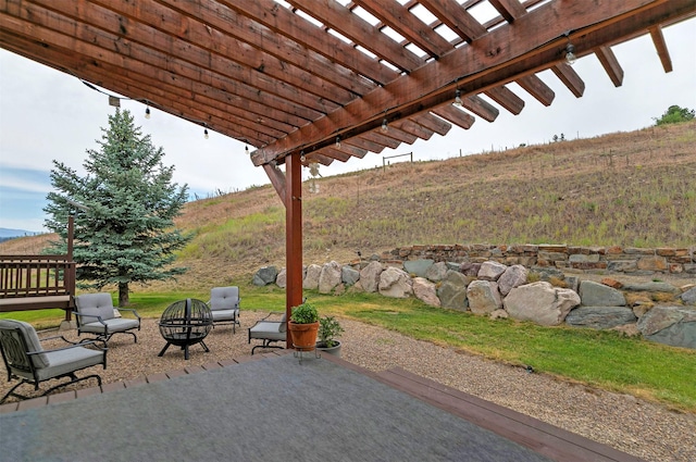 15660 Sara Jo Ln, Frenchtown, MT 59834 - view of patio with an outdoor fire pit and a pergola