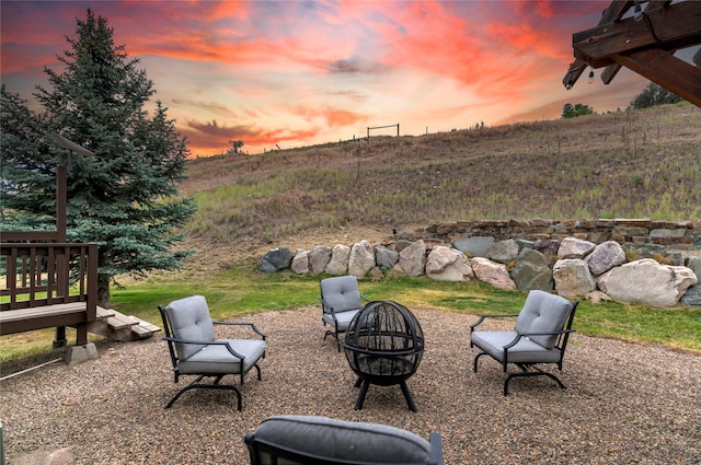 15660 Sara Jo Ln, Frenchtown, MT 59834 - view of yard featuring an outdoor fire pit and a wooden deck