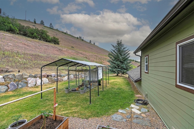 15660 Sara Jo Ln, Frenchtown, MT 59834 - view of grassy yard with a garden