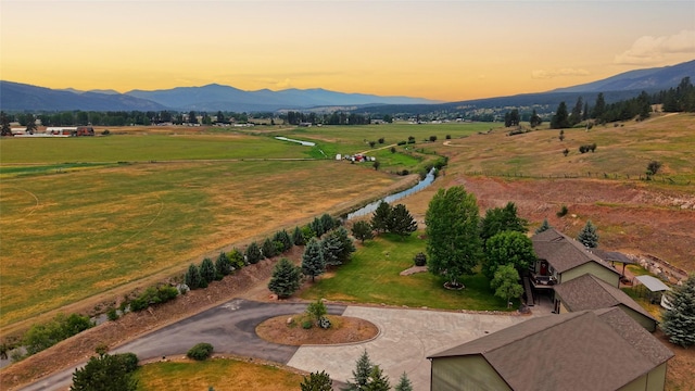15660 Sara Jo Ln, Frenchtown, MT 59834 - aerial view at dusk of a mountain view and a rural view
