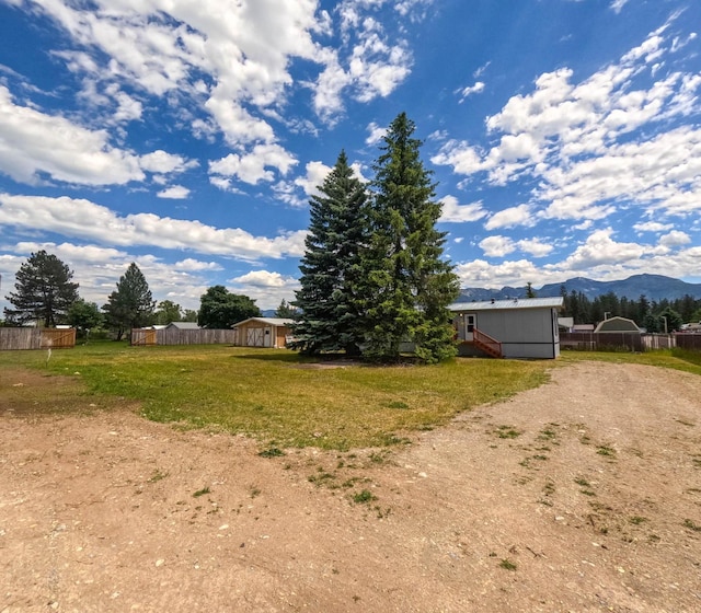 36240 Felsman St, Pablo, MT 59855 - view of yard with a mountain view and a storage shed