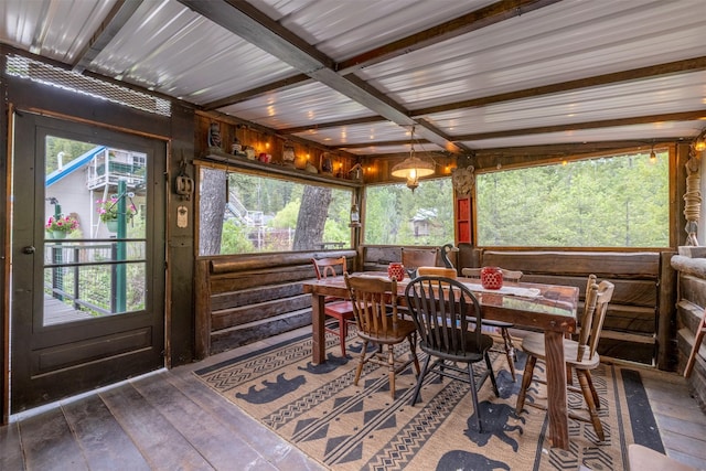 3422 Rimini Rd, Helena, MT 59601 - sunroom / solarium featuring hardwood / wood-style floors and outdoor dining area