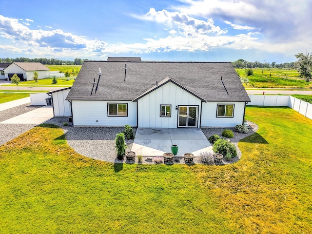 915 Stewart Loop, Bozeman, MT 59718 - back of house featuring board and batten siding, a patio area, and a shingled roof