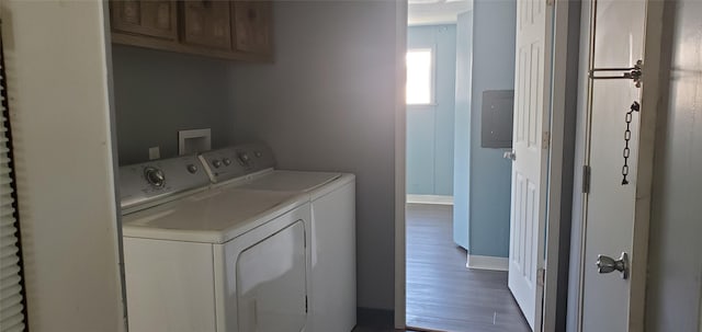 1805 Joslyn St Unit 25, Helena, MT 59601 - washroom featuring cabinet space, independent washer and dryer, and dark wood finished floors