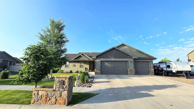 104 39th Ave NE, Great Falls, MT 59404 - single story home with an attached garage, concrete driveway, and stone siding